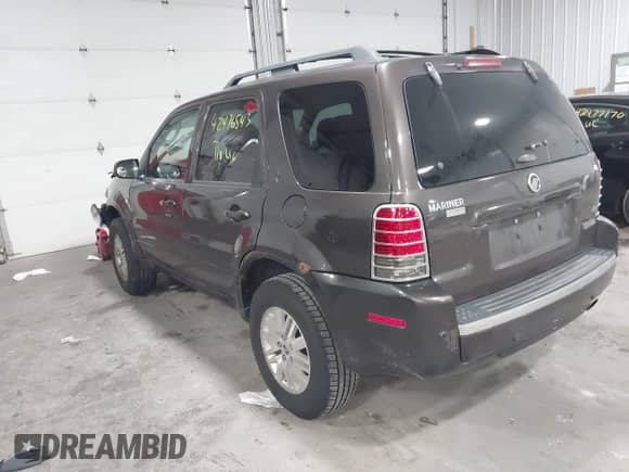 2006 Mercury Mariner Luxury z VIN 4M2CU56126KJ03006, wystawiony jako IAAI lot #42476543 z przebiegiem 114 288 mil mil oraz . Historia ofert i sprzedaży dostępna na DreamBid. Obrazek 3.