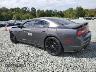 ✅ 2014 Dodge Charger RT • VIN: 2C3CDXCT1EH370154 • Лот: 80934955. Опубликован ранее на Copart с пробегом 124 401 миль. Бесплатный доступ к архиву аукционных продаж из США и подробный отчёт об истории автомобиля на DreamBid. Изображение 2.