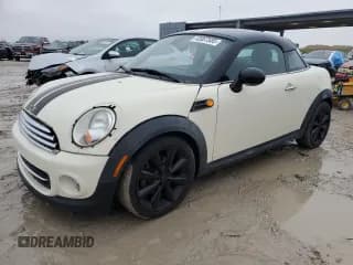 ✅ 2014 MINI Coupe • VIN: WMWSX1C53ET507947 • Лот: 42087585. Опубликован ранее на Copart с пробегом 113 068 миль. Бесплатный доступ к архиву аукционных продаж из США и подробный отчёт об истории автомобиля на DreamBid. Изображение 1.