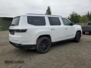 ✅ 2023 Jeep Grand Wagoneer • VIN: 1C4SJVEJ1PS560841 • Lot: 61099385. Listed on Copart with 15,467 mi. Free auction sales archive from the USA and detailed vehicle history report at DreamBid. Image 3.