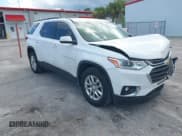 ✅ 2021 Chevrolet Traverse LT Cloth • VIN: 1GNERGKW0MJ126548 • Lot: 42998904. Wystawiony na IAAI z przebiegiem 66 776 mil. Bezpłatny archiwum sprzedaży aukcyjnych z USA i szczegółowy raport historii pojazdu na DreamBid. Zdjęcie 1.