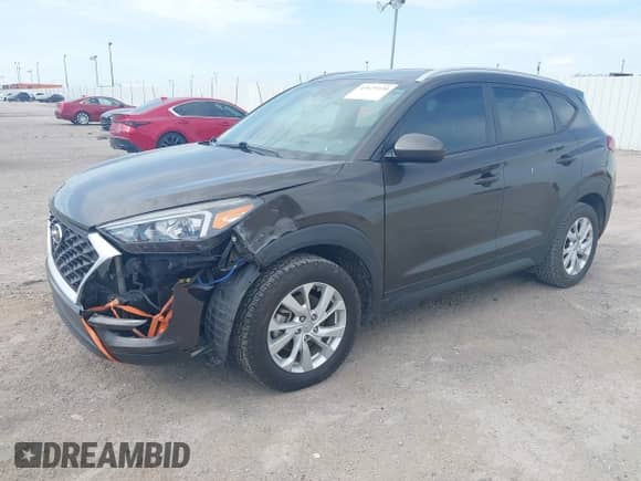 2019 Hyundai Tucson Value with VIN KM8J33A45KU047465, listed as a IAAI auction lot 42625120 with 136,962 mi miles and . Bid and sale history available at DreamBid. Image 2.