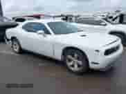 2014 Dodge Challenger Rallye Redline with VIN 2C3CDYAG6EH289856, listed as a IAAI auction lot 42866546 with 122,134 mi miles and . Bid and sale history available at DreamBid. Image 1.