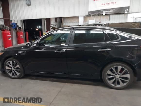 ✅ 2016 Kia Optima SX Turbo • VIN: 5XXGW4L29GG050616 • Лот: 43059348. Опубликован ранее на IAAI с пробегом 117 336 миль. Бесплатный доступ к архиву аукционных продаж из США и подробный отчёт об истории автомобиля на DreamBid. Изображение 14.