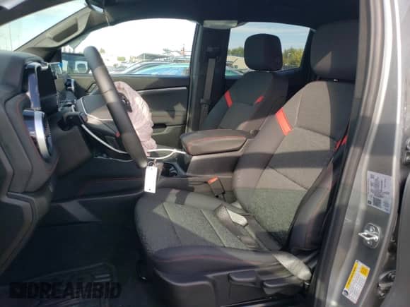 2024 Chevrolet Colorado 4WD Z71 with VIN 1GCPTDEKXR1303883, listed as a Copart auction lot 84041475 with 4,447 mi miles and Salvage title. Bid and sale history available at DreamBid. Image 7.