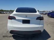 ✅ 2023 Tesla Model Y Long Range • VIN: 7SAYGDEE4PF738828 • Lot: 67268345. Wystawiony na Copart z przebiegiem 18 656 mil. Bezpłatny archiwum sprzedaży aukcyjnych z USA i szczegółowy raport historii pojazdu na DreamBid. Zdjęcie 6.