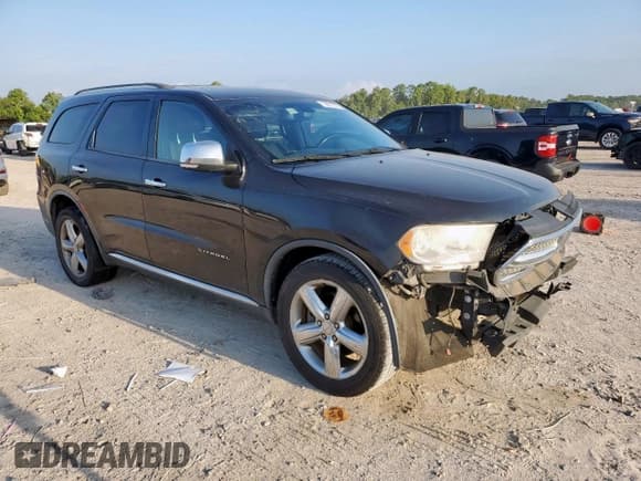 ✅ 2012 Dodge Durango Citadel • VIN: 1C4RDHEG7CC330480 • Lot: 68715775. Listed on Copart with 192,857 mi. Free auction sales archive from the USA and detailed vehicle history report at DreamBid. Image 4.