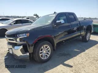 2019 Chevrolet Silverado 1500 LT with VIN 1GCRYDEK7KZ261335, listed as a Copart auction lot 60326435 with 56,909 mi miles and Salvage title. Bid and sale history available at DreamBid. Image 1.