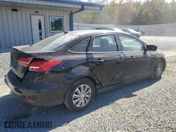 ✅ 2017 Ford Focus S • VIN: 1FADP3E23HL221097 • Лот: 82450025. Опубликован ранее на Copart с пробегом 98 700 миль. Бесплатный доступ к архиву аукционных продаж из США и подробный отчёт об истории автомобиля на DreamBid. Изображение 3.