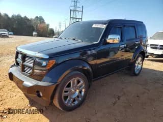 ✅ 2011 Dodge Nitro Heat • VIN: 1D4PT4GK5BW528978 • Lot: 92601405. Listed on Copart with 155,515 mi. Free auction sales archive from the USA and detailed vehicle history report at DreamBid. Image 1.
