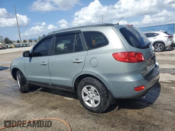 ✅ 2009 Hyundai Santa Fe GLS • VIN: 5NMSG13D79H266895 • Lot: 78307334. Listed on Copart with 123,008 mi. Free auction sales archive from the USA and detailed vehicle history report at DreamBid. Image 2.