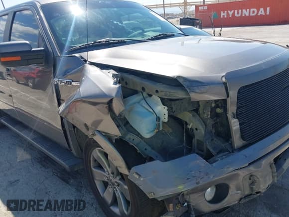 ✅ 2013 Ford F-150 XLT • VIN: 1FTFW1CFXDFD56277 • Lot: 43078666. Listed on IAAI with 111,115 mi. Free auction sales archive from the USA and detailed vehicle history report at DreamBid. Image 6.