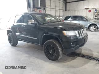 ✅ 2011 Jeep Grand Cherokee Overland • VIN: 1J4RR6GT3BC701224 • Lot: 42948143. Listed on IAAI with 199,408 mi. Free auction sales archive from the USA and detailed vehicle history report at DreamBid. Image 1.