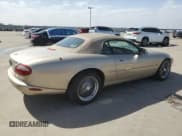 ✅ 1998 Jaguar XK • VIN: SAJGX2242WC027750 • Lot: 47766535. Listed on Copart with 113,161 mi. Free auction sales archive from the USA and detailed vehicle history report at DreamBid. Image 3.