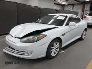 2008 Hyundai Tiburon GS с VIN KMHHM66D98U280005, выставлен на аукционе IAAI как лот 42580014 с пробегом 267 858 миль миль и . История ставок и продаж доступна на DreamBid. Изображение 2.