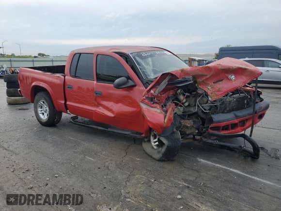 2001 Dodge Dakota Sport with VIN 1B7HG2ANX1S333610, listed as a Copart auction lot 68866734 with 245,064 mi miles and Salvage title. Bid and sale history available at DreamBid. Image 4.