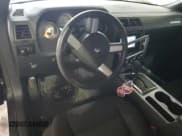 ✅ 2010 Dodge Challenger SE • VIN: 2B3CJ4DV1AH103448 • Lot: 85185074. Wystawiony na Copart z przebiegiem 202 250 mil. Bezpłatny archiwum sprzedaży aukcyjnych z USA i szczegółowy raport historii pojazdu na DreamBid. Zdjęcie 8.