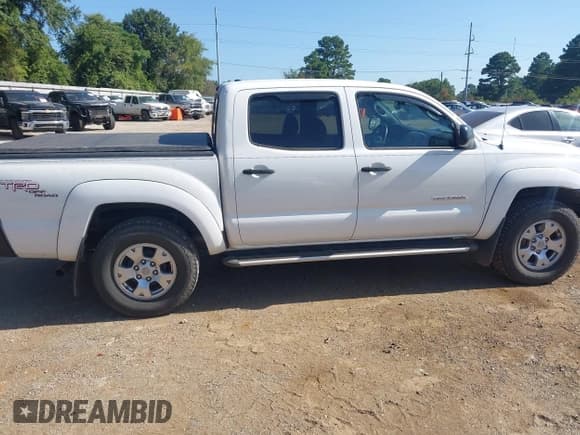 ✅ 2011 Toyota Tacoma PreRunner • VIN: 5TFJU4GN4BX005312 • Lot: 42840848. Listed on IAAI with 155,049 mi. Free auction sales archive from the USA and detailed vehicle history report at DreamBid. Image 13.