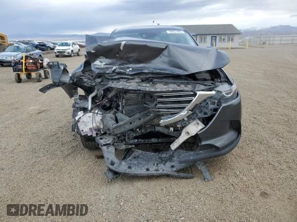 ✅ 2017 Mazda CX-9 Touring • VIN: JM3TCBCY4H0142839 • Lot: 48851065. Wystawiony na Copart z przebiegiem 154 078 mil. Bezpłatny archiwum sprzedaży aukcyjnych z USA i szczegółowy raport historii pojazdu na DreamBid. Zdjęcie 5.