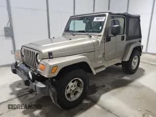 ✅ 2003 Jeep Wrangler Sahara • VIN: 1J4FA59S33P363830 • Lot: 62773325. Listed on Copart with 114,286 mi. Free auction sales archive from the USA and detailed vehicle history report at DreamBid. Image 1.