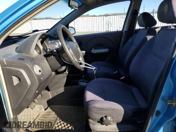 2006 Chevrolet Aveo LT with VIN KL1TG66676B645952, listed as a Copart auction lot 88801935 with 97,049 mi miles and Salvage title. Bid and sale history available at DreamBid. Image 7.