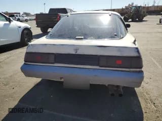 ✅ 1985 Mazda RX-7 • VIN: JM1FB3310F0860015 • Lot: 80110214. Wystawiony na Copart z przebiegiem 145 208 mil. Bezpłatny archiwum sprzedaży aukcyjnych z USA i szczegółowy raport historii pojazdu na DreamBid. Zdjęcie 6.