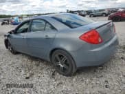 ✅ 2009 Pontiac G6 1SA • VIN: 1G2ZG57N694177731 • Lot: 70713705. Wystawiony na Copart z przebiegiem Nie podano. Bezpłatny archiwum sprzedaży aukcyjnych z USA i szczegółowy raport historii pojazdu na DreamBid. Zdjęcie 2.