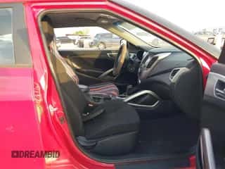 2015 Hyundai Veloster with VIN KMHTC6ADXFU236130, listed as a IAAI auction lot 43521374 with 131,213 mi miles and . Bid and sale history available at DreamBid. Image 5.