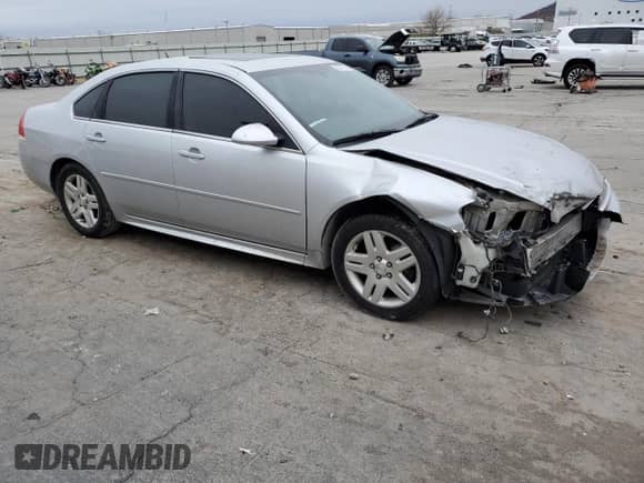 2014 Chevrolet Impala LT with VIN 2G1WB5E30E1168813, listed as a Copart auction lot 85085094 with 121,946 mi miles and Salvage title. Bid and sale history available at DreamBid. Image 4.