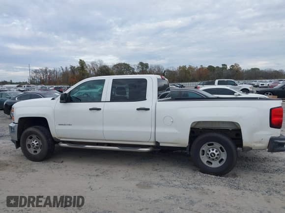 ✅ 2016 Chevrolet Silverado 2500HD Work Truck • VIN: 1GC1CUEG6GF135824 • Lot: 41037016. Listed on IAAI with 239,295 mi. Free auction sales archive from the USA and detailed vehicle history report at DreamBid. Image 13.