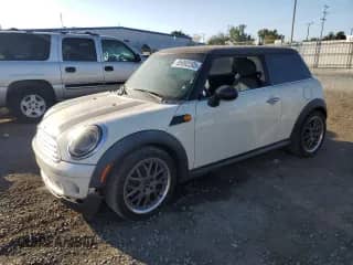 2009 MINI Hardtop with VIN WMWMF335X9TW73914, listed as a Copart auction lot 85892285 with 146,765 mi miles and Clean title. Bid and sale history available at DreamBid. Image 1.