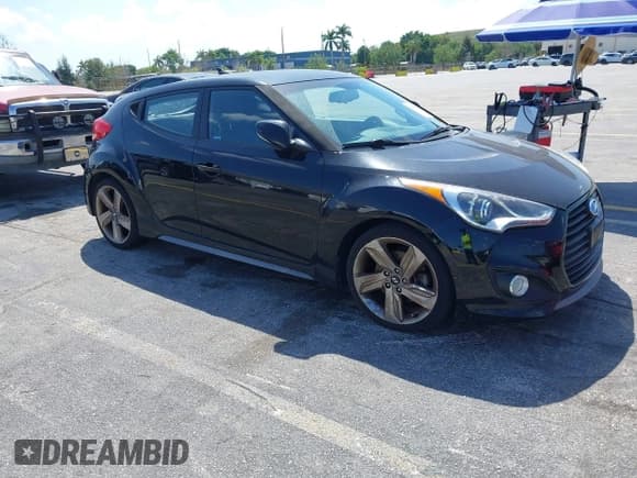 ✅ 2014 Hyundai Veloster Turbo • VIN: KMHTC6AE2EU184967 • Lot: 41780186. Wystawiony na IAAI z przebiegiem 104 822 mil. Bezpłatny archiwum sprzedaży aukcyjnych z USA i szczegółowy raport historii pojazdu na DreamBid. Zdjęcie 1.