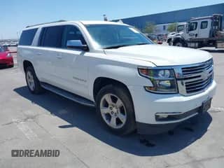 2017 Chevrolet Suburban Premier with VIN 1GNSKJKC1HR228961, listed as a IAAI auction lot 42574812 with 108,606 mi miles and . Bid and sale history available at DreamBid. Image 1.