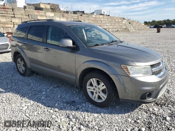 ✅ 2012 Dodge Journey SXT • VIN: 3C4PDCBB6CT341459 • Lot: 82007485. Listed on Copart with 229,749 mi. Free auction sales archive from the USA and detailed vehicle history report at DreamBid. Image 4.