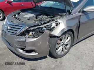 2012 Hyundai Azera z VIN KMHFG4JG7CA152408, wystawiony jako IAAI lot #41968451 z przebiegiem 146 089 mil mil oraz . Historia ofert i sprzedaży dostępna na DreamBid. Obrazek 6.