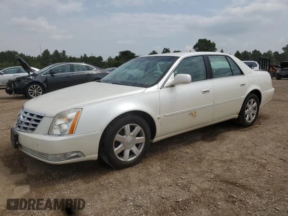 ✅ 2007 Cadillac DTS V8 • VIN: 1G6KD57Y97U222449 • Лот: 60169305. Опубликован ранее на Copart с пробегом 228 796 миль. Бесплатный доступ к архиву аукционных продаж из США и подробный отчёт об истории автомобиля на DreamBid. Изображение 1.