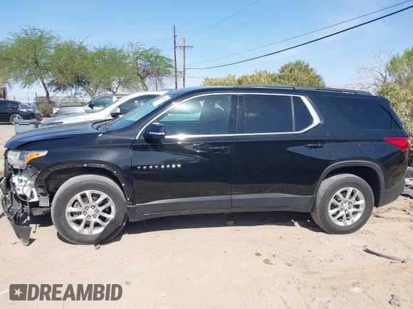 ✅ 2020 Chevrolet Traverse LT Cloth • VIN: 1GNEVMKW1LJ199503 • Lot: 42487487. Wystawiony na IAAI z przebiegiem 94 367 mil. Bezpłatny archiwum sprzedaży aukcyjnych z USA i szczegółowy raport historii pojazdu na DreamBid. Zdjęcie 14.
