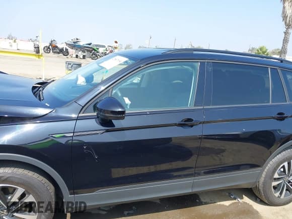 ✅ 2024 Volkswagen Tiguan S • VIN: 3VVRB7AX4RM117954 • Lot: 42887194. Listed on IAAI with Not provided. Free auction sales archive from the USA and detailed vehicle history report at DreamBid. Image 13.