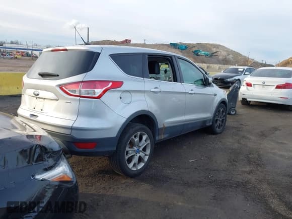 ✅ 2013 Ford Escape SEL • VIN: 1FMCU9HX0DUA78893 • Lot: 43870119. Wystawiony na IAAI z przebiegiem 110 347 mil. Bezpłatny archiwum sprzedaży aukcyjnych z USA i szczegółowy raport historii pojazdu na DreamBid. Zdjęcie 4.