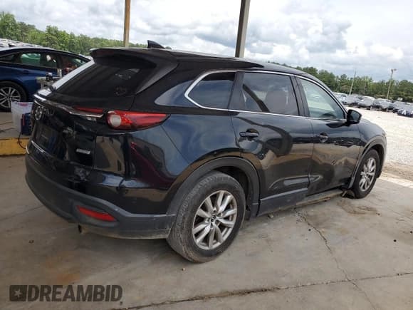 ✅ 2016 Mazda CX-9 Sport • VIN: JM3TCBBY6G0102634 • Lot: 61077895. Listed on Copart with 118,971 mi. Free auction sales archive from the USA and detailed vehicle history report at DreamBid. Image 3.