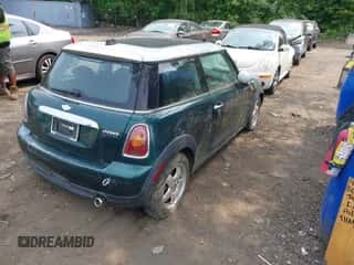 2010 MINI Hardtop with VIN WMWMF3C57ATZ24618, listed as a IAAI auction lot 42426752 with 68,973 mi miles and . Bid and sale history available at DreamBid. Image 4.