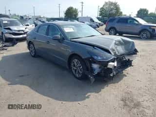 2023 Hyundai Sonata SEL z VIN KMHL64JA8PA280888, wystawiony jako IAAI lot #43255401 z przebiegiem 62 727 mil mil oraz . Historia ofert i sprzedaży dostępna na DreamBid. Obrazek 1.