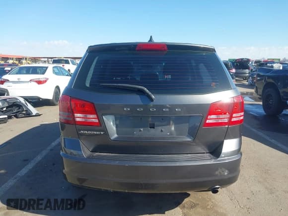 ✅ 2014 Dodge Journey SE • VIN: 3C4PDCAB5ET182518 • Lot: 43214035. Listed on IAAI with 125,020 mi. Free auction sales archive from the USA and detailed vehicle history report at DreamBid. Image 17.