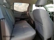 ✅ 2023 Toyota Tacoma SR • VIN: 3TYCZ5AN4PT153874 • Лот: 92057885. Опубликован ранее на Copart с пробегом 17 831 миль. Бесплатный доступ к архиву аукционных продаж из США и подробный отчёт об истории автомобиля на DreamBid. Изображение 10.