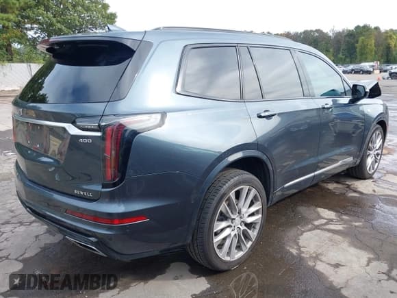 ✅ 2021 Cadillac XT6 Sport • VIN: 1GYKPGRS2MZ200990 • Lot: 43315638. Listed on IAAI with 104,071 mi. Free auction sales archive from the USA and detailed vehicle history report at DreamBid. Image 4.