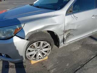 2014 Chevrolet Malibu LT z VIN 1G11E5SL9EF297650, wystawiony jako IAAI lot #43390723 z przebiegiem 297 680 mil mil oraz . Historia ofert i sprzedaży dostępna na DreamBid. Obrazek 6.