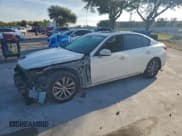 ✅ 2014 Infiniti Q50 Premium • VIN: JN1BV7AP0EM681066 • Lot: 94933945. Listed on Copart with 112,213 mi. Free auction sales archive from the USA and detailed vehicle history report at DreamBid. Image 1.