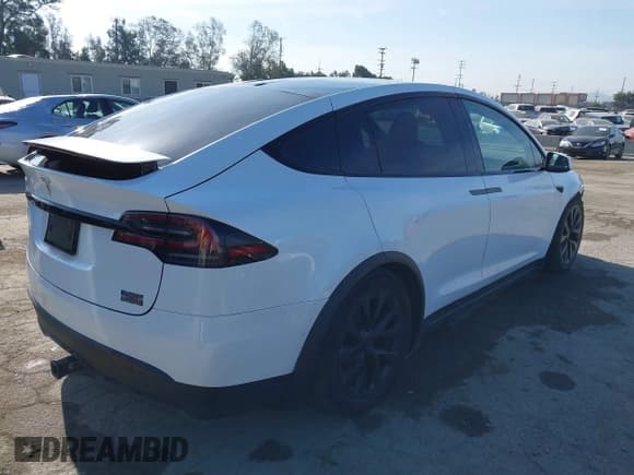 ✅ 2022 Tesla Model X Plaid • VIN: 7SAXCBE63NF337529 • Lot: 42066904. Wystawiony na IAAI z przebiegiem 56 933 mil. Bezpłatny archiwum sprzedaży aukcyjnych z USA i szczegółowy raport historii pojazdu na DreamBid. Zdjęcie 4.