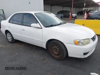 ✅ 2001 Toyota Corolla LE • VIN: 1NXBR12E11Z526950 • Lot: 43631484. Listed on IAAI with 215,386 mi. Free auction sales archive from the USA and detailed vehicle history report at DreamBid. Image 1.