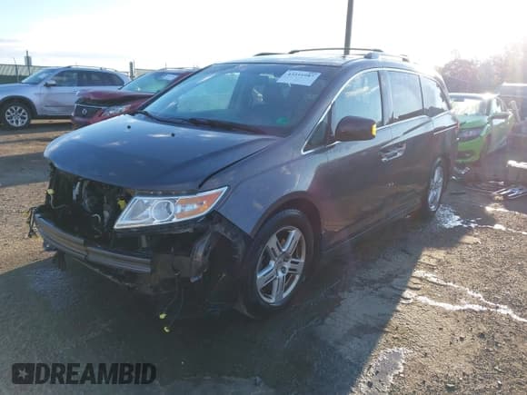 ✅ 2012 Honda Odyssey Touring • VIN: 5FNRL5H92CB028533 • Lot: 43516987. Wystawiony na IAAI z przebiegiem 124 254 mil. Bezpłatny archiwum sprzedaży aukcyjnych z USA i szczegółowy raport historii pojazdu na DreamBid. Zdjęcie 2.